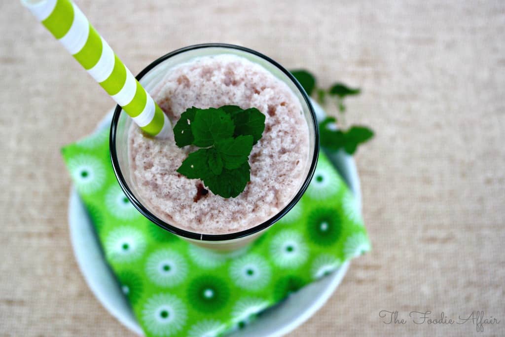 Chocolate Mint Protein Smoothie with a green straw