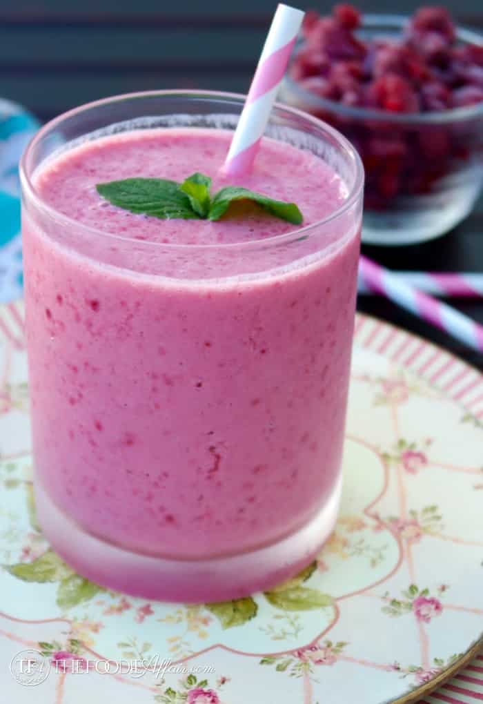 Cranberry Raspberry Smoothie with a pink straw