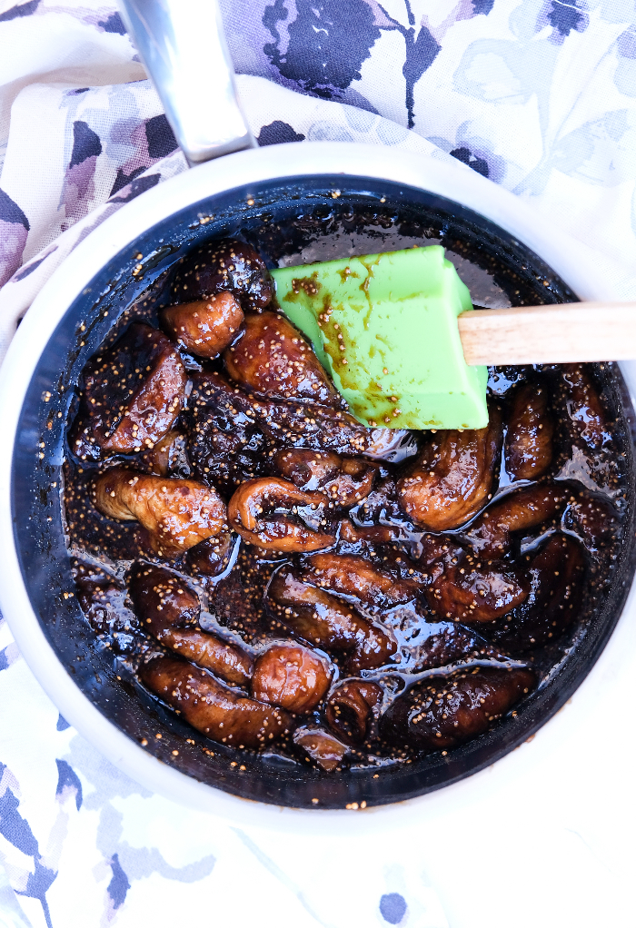 Fig chutney simmering in a saucepan.