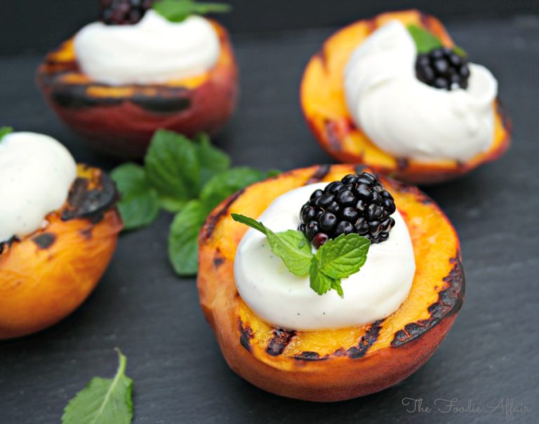 Grilled Peaches and Yogurt Cream with a fresh blackberry in the center