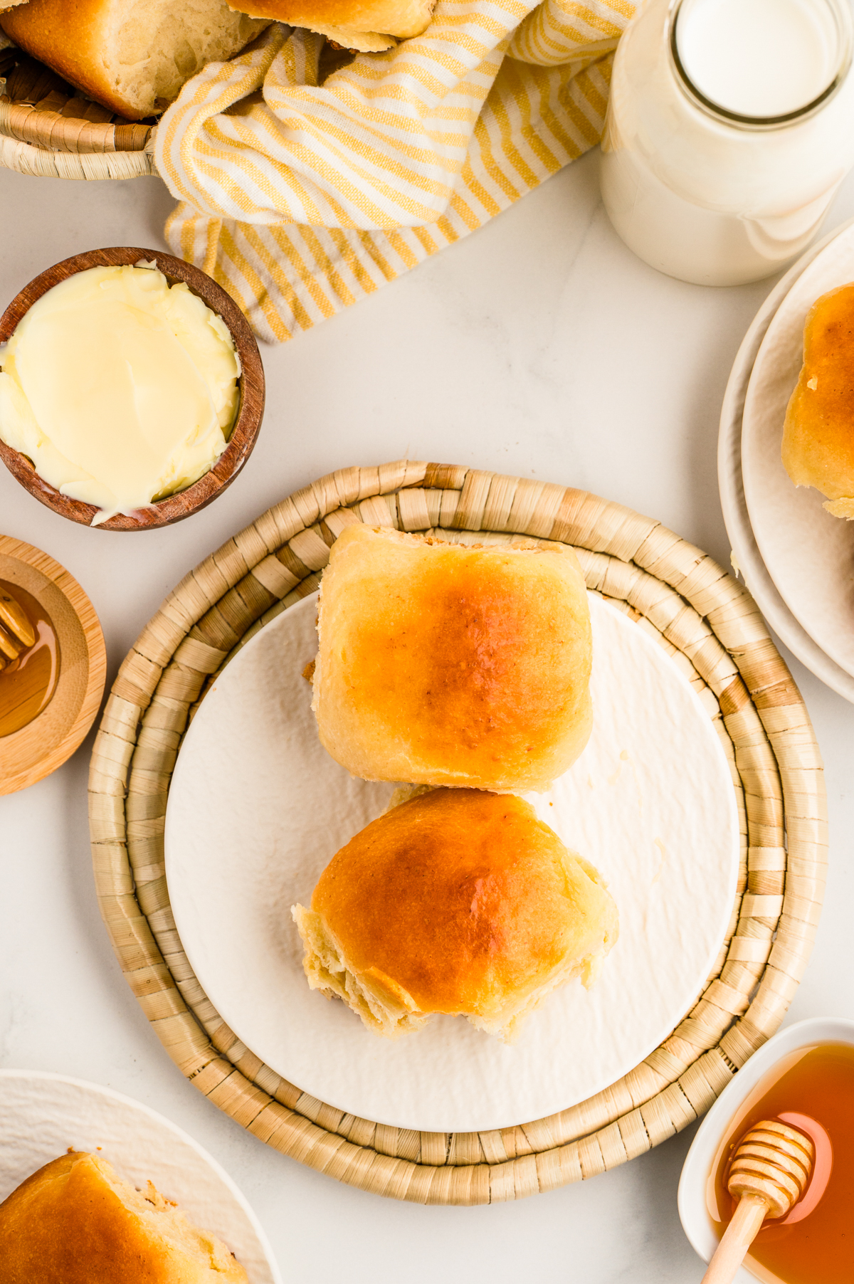 Top view of rolls with butter on the side.
