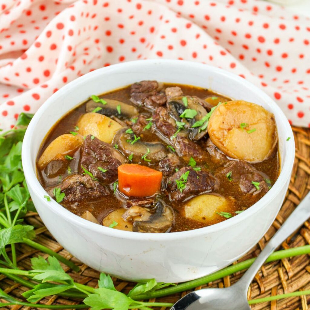 Bowl full of beef bourguignon.