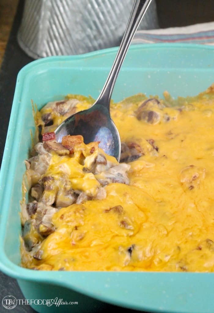 Cheesy mushroom casserole baked in a teal 8 x8 inch pan #Casserole #Vegetarian #Mushrooms | www.thefoodieaffair.com