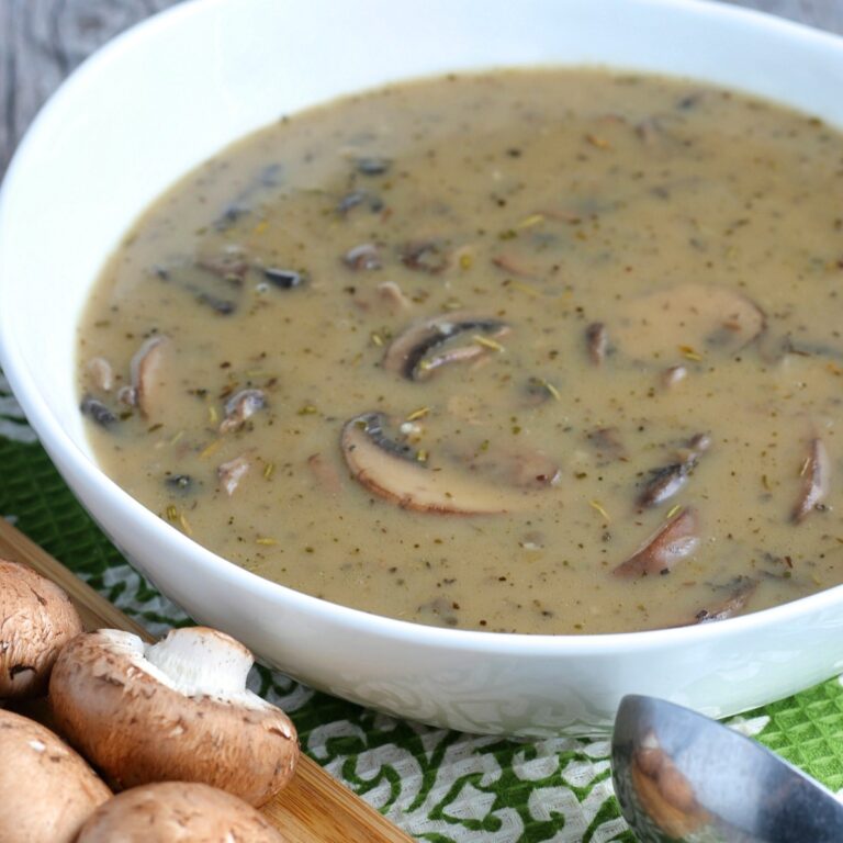 Full white bowl of mushroom gravy for topping steak, pork, or chicken