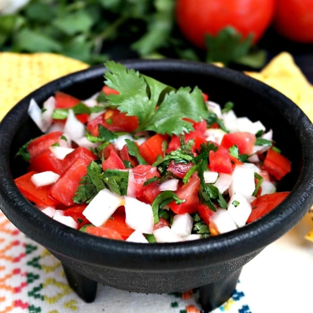 Pico de gallo is a classic Mexican condiment that's fresh, zesty, and easy to make. Use as a topping or side for tacos, grilled meats, nachos, or simply served with tortilla chips.