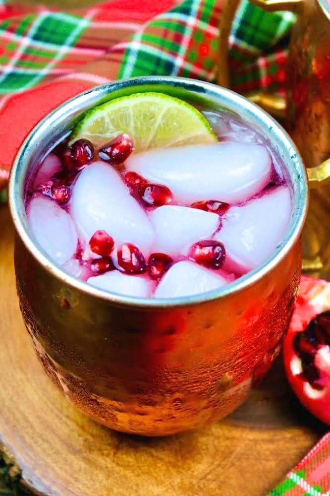 A copper mug with moscow mule cocktail.