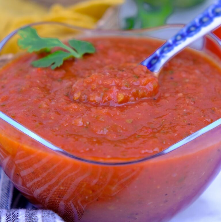 Homemade ranchero sauce in a clear bowl.