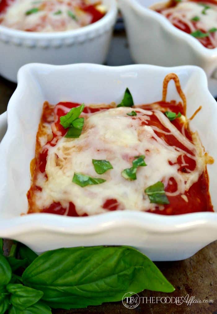 Easy Ravioli Lasagnas served in individual ramekins. The Foodie Affair