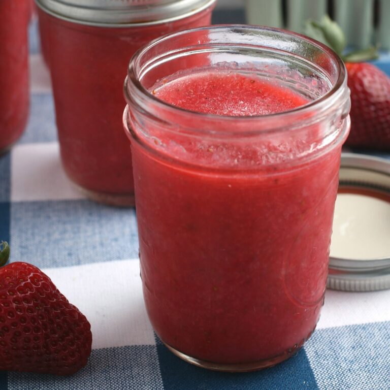Sugar free strawberry freezer jam in a mason jar.